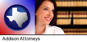 Addison, Texas - a young, female attorney in a law library