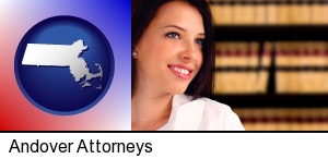 Andover, Massachusetts - a young, female attorney in a law library