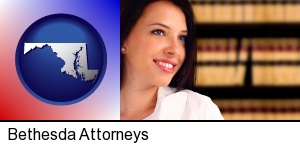 Bethesda, Maryland - a young, female attorney in a law library
