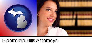 Bloomfield Hills, Michigan - a young, female attorney in a law library