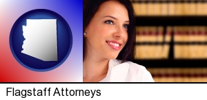 Flagstaff, Arizona - a young, female attorney in a law library