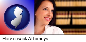 Hackensack, New Jersey - a young, female attorney in a law library
