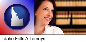 Idaho Falls, Idaho - a young, female attorney in a law library