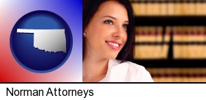 Norman, Oklahoma - a young, female attorney in a law library