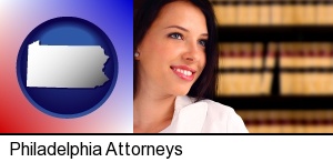 Philadelphia, Pennsylvania - a young, female attorney in a law library