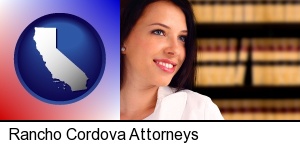 a young, female attorney in a law library in Rancho Cordova, CA