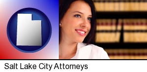 Salt Lake City, Utah - a young, female attorney in a law library