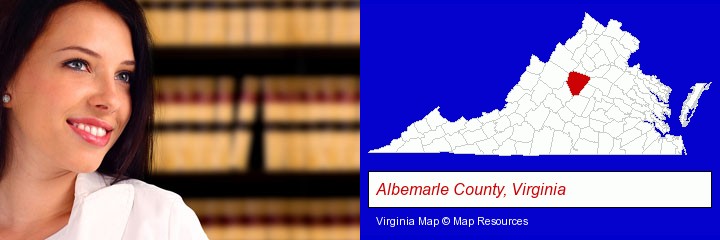 a young, female attorney in a law library; Albemarle County, Virginia highlighted in red on a map