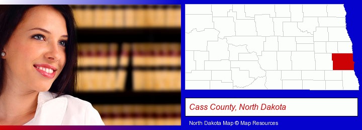 a young, female attorney in a law library; Cass County, North Dakota highlighted in red on a map
