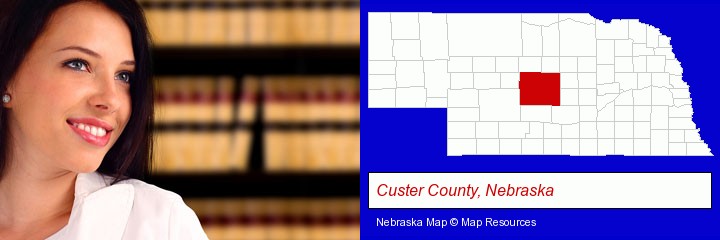 a young, female attorney in a law library; Custer County, Nebraska highlighted in red on a map