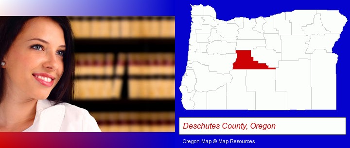 a young, female attorney in a law library; Deschutes County, Oregon highlighted in red on a map