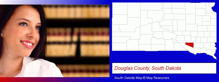 a young, female attorney in a law library; Douglas County, South Dakota highlighted in red on a map