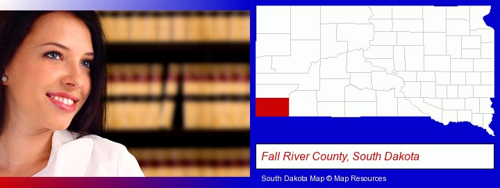 a young, female attorney in a law library; Fall River County, South Dakota highlighted in red on a map