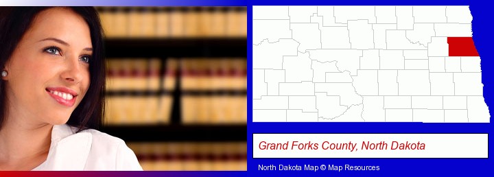 a young, female attorney in a law library; Grand Forks County, North Dakota highlighted in red on a map