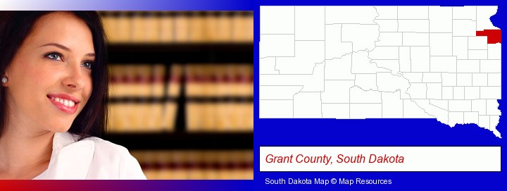 a young, female attorney in a law library; Grant County, South Dakota highlighted in red on a map