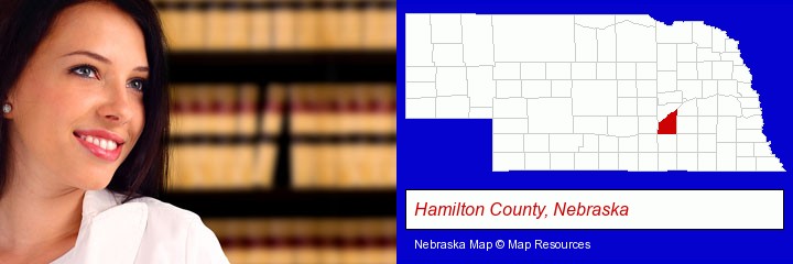a young, female attorney in a law library; Hamilton County, Nebraska highlighted in red on a map