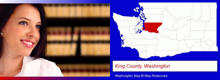 a young, female attorney in a law library; King County, Washington highlighted in red on a map