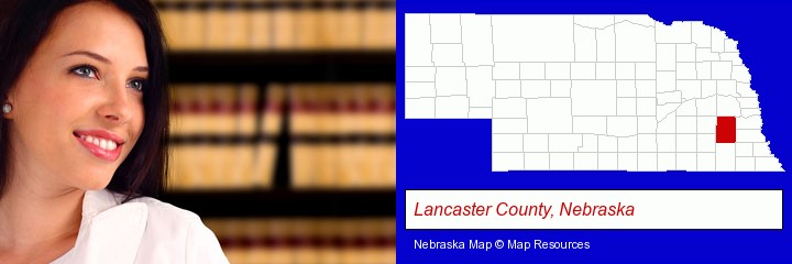 a young, female attorney in a law library; Lancaster County, Nebraska highlighted in red on a map