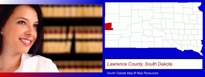 a young, female attorney in a law library; Lawrence County, South Dakota highlighted in red on a map