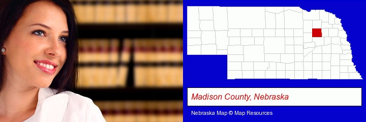 a young, female attorney in a law library; Madison County, Nebraska highlighted in red on a map