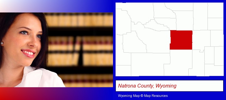 a young, female attorney in a law library; Natrona County, Wyoming highlighted in red on a map