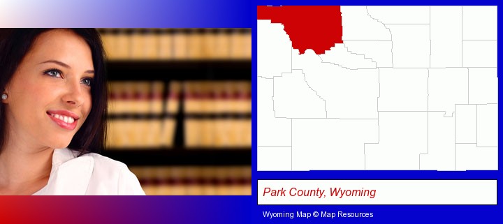 a young, female attorney in a law library; Park County, Wyoming highlighted in red on a map