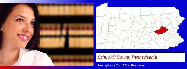 a young, female attorney in a law library; Schuylkill County, Pennsylvania highlighted in red on a map