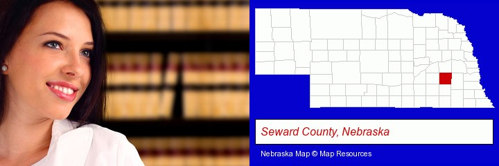 a young, female attorney in a law library; Seward County, Nebraska highlighted in red on a map