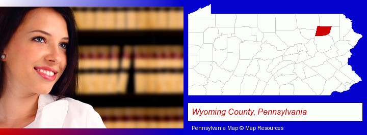 a young, female attorney in a law library; Wyoming County, Pennsylvania highlighted in red on a map