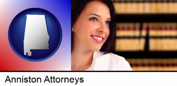 a young, female attorney in a law library in Anniston, AL