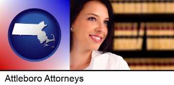 a young, female attorney in a law library in Attleboro, MA