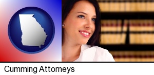 Cumming, Georgia - a young, female attorney in a law library