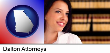 a young, female attorney in a law library in Dalton, GA