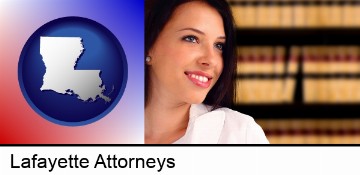 a young, female attorney in a law library in Lafayette, LA