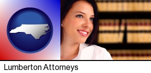 a young, female attorney in a law library in Lumberton, NC