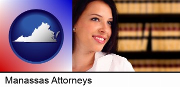 a young, female attorney in a law library in Manassas, VA
