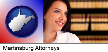 a young, female attorney in a law library in Martinsburg, WV