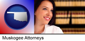 a young, female attorney in a law library in Muskogee, OK