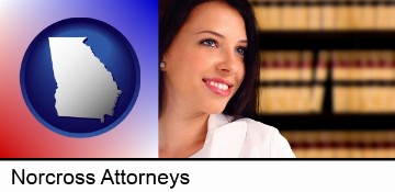 a young, female attorney in a law library in Norcross, GA
