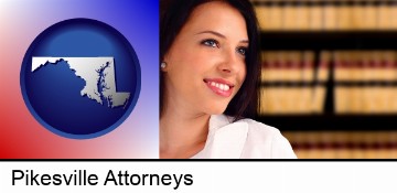 a young, female attorney in a law library in Pikesville, MD