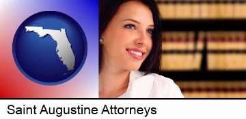 a young, female attorney in a law library in Saint Augustine, FL