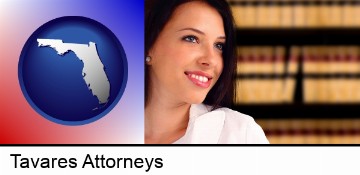 a young, female attorney in a law library in Tavares, FL