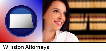 a young, female attorney in a law library in Williston, ND